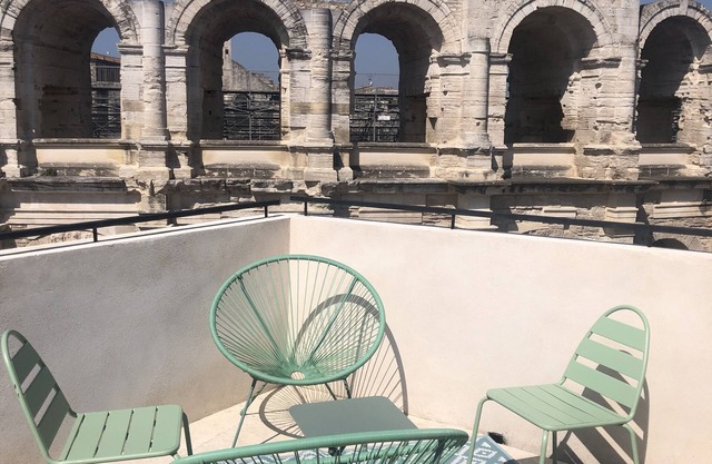 Opposite Les Arenes and La Major