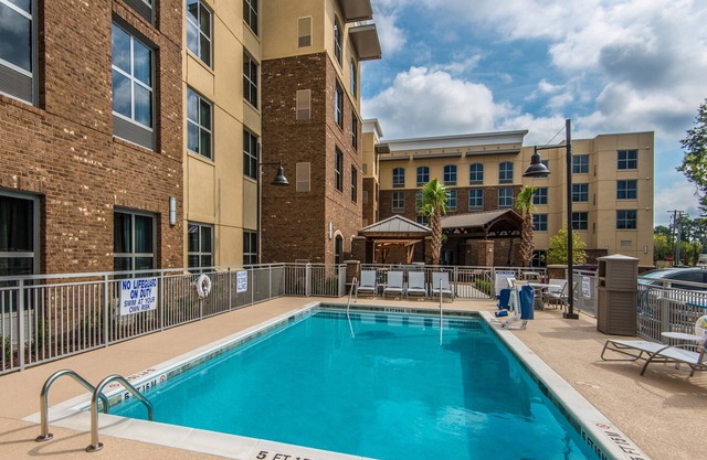 Outdoor Pool + Free Wi-Fi | Great Location!