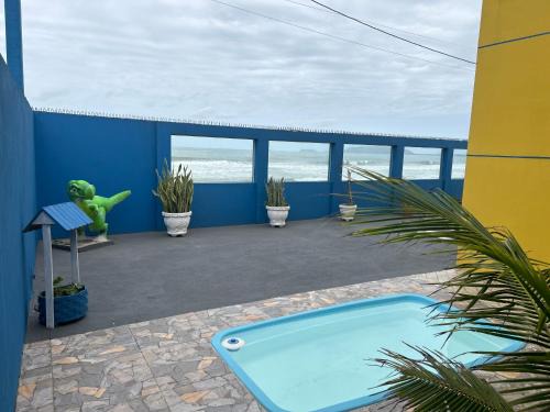 PÉ NA AREIA Apto Manfron