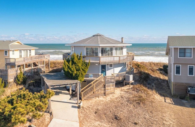 Panoramic ocean views abound at this oceanfront Duck home!