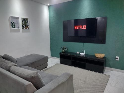 Para família com Ar condicionado, Churrasqueira e wi-fi