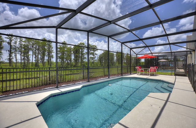 Peaceful Paradise Pool Home with King suite 10 minutes to Disney World