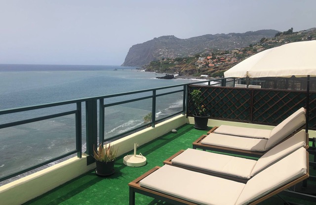 Penthouse apartment with air conditioning, ocean view & private rooftop terrace