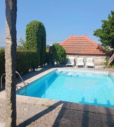 Pequena Casa rústica com piscina