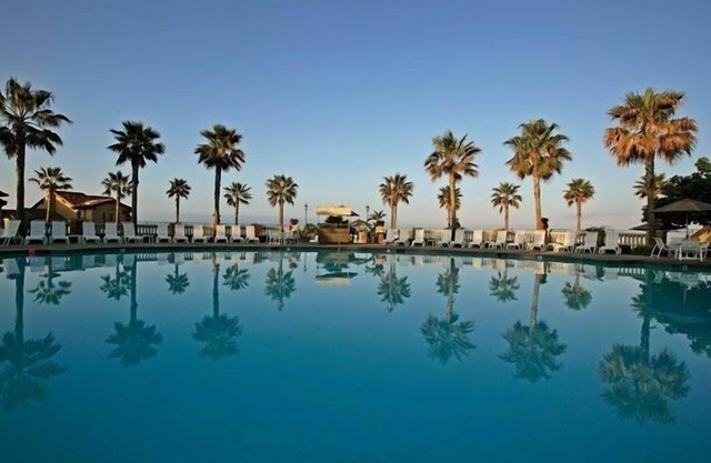 Perched on a bluff overlooking the beautiful Newport coastline.