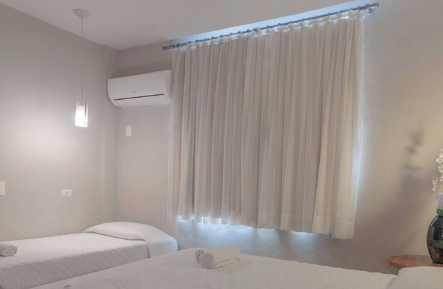 Perfect Executive Triple Room for a Couple and Friend in Central Curitiba Stay