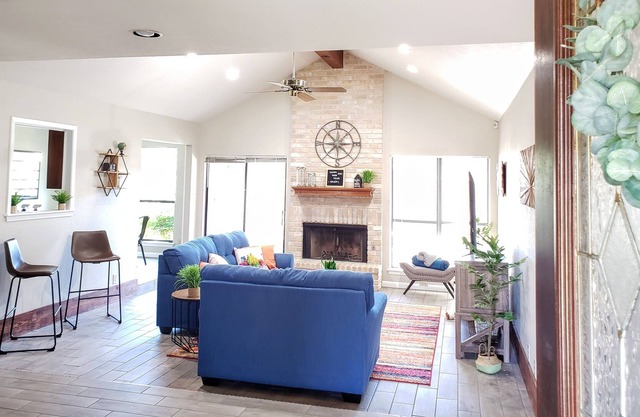 Perfectly located, Bright & Charming House with a screened in porch & garage.