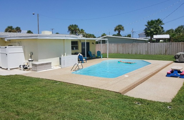 Pet Friendly Beach House With Pool. The beach is just a 1 min walk.