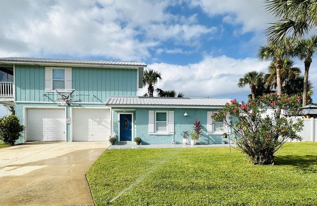 Pet friendly beach home across the street from marina and restaurant!