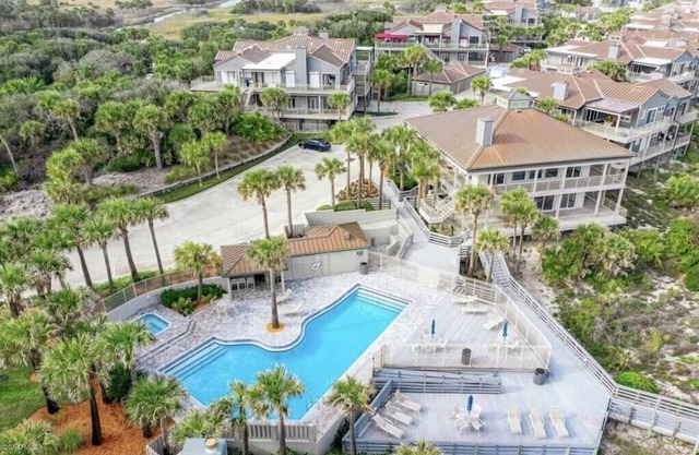 Picturesque, oceanfront unit just steps to beach, in desirable gated community.