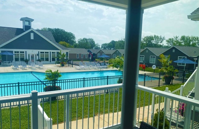 Pool front in Lake Erie resort. Steps to the sandy beach, Golf cart included!