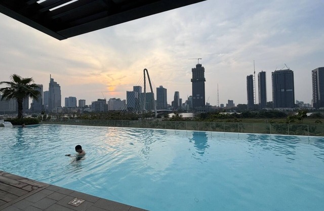 Premier Saigon Stay: Luxe 2-Bedroom at Metropole Opera