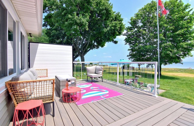 Prepare to fall in love with this adorably tropical beach front property!