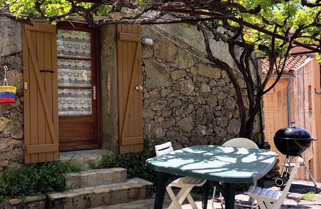 pretty stone house in the heart of the village