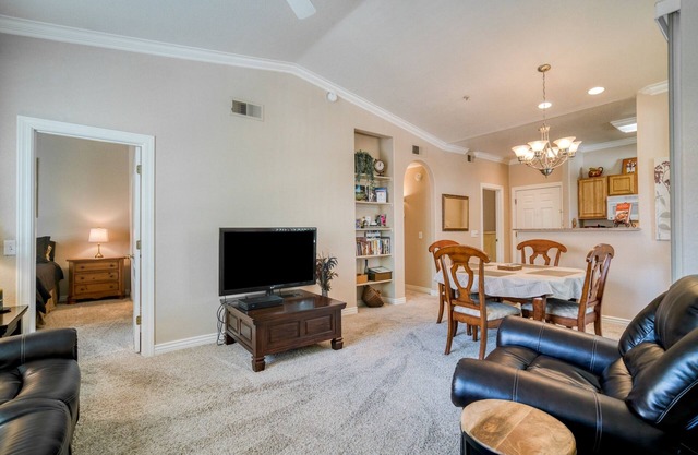 Pristine Top Floor Condo With Access To Clubhouse & Pools by RedAwning