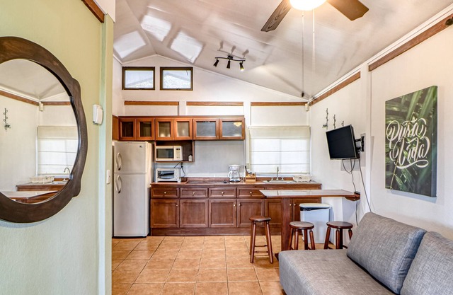 Private cabin, surrounded by gardens and trees, with a shared pool!