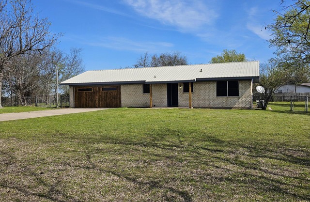 Private home with *GAME ROOM* on over half an acre of land!