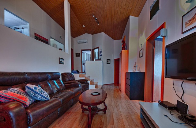 Private house, private garden, beautiful village. Great mountain- and fjord view