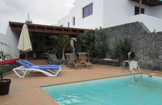 private pool with huge games room inviting to relax and have fun