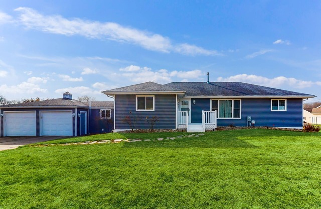Private property with three-season room, hot tub, firepit, games, W/D, & AC