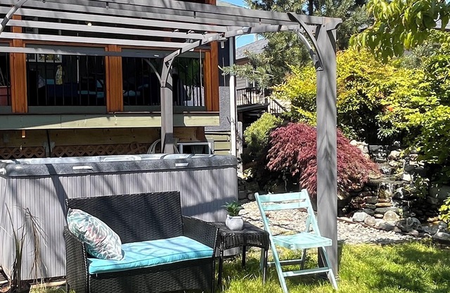 Private Suite w/Hot Tub | waterfall | 5 Min to Beach | 4 beds | long term stays