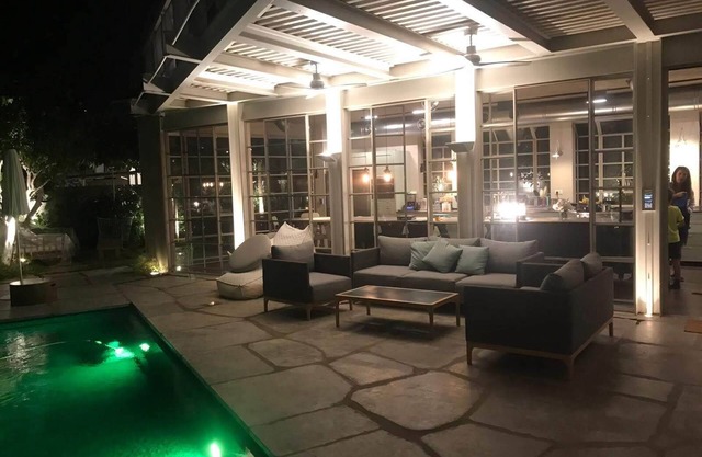 private villa house . nice garden , pool in the city , quite/