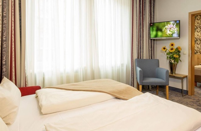 Quadruple room standard shower/toilet - Hotel Löwengarten