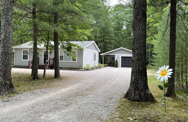 Quaint & comfy bungalow that sleeps four. A camper is allowed for more people.