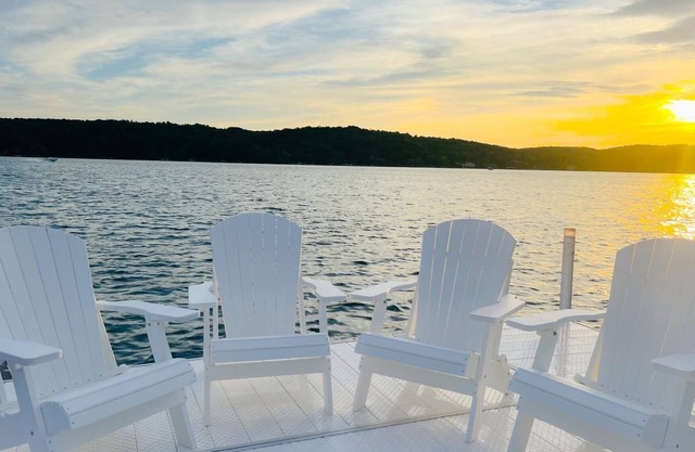 Quaint cottage with 2 separate homes and dock on the North Arm of Walloon Lake.