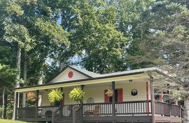Quaint Piney Creek cabin with wrap-around deck will restore you!