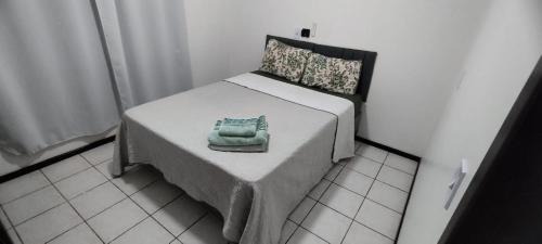 Quarto em casa de família