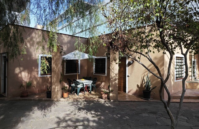 Quiet bungalow in a garden with parking
