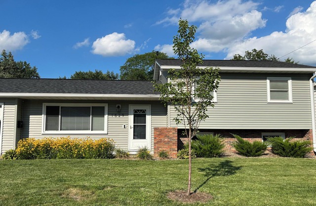 Quiet neighborhood surrounded by parks near multipurpose trail through QCn