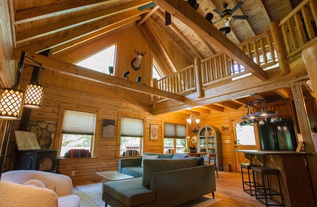 Quiet Riverfront Log Cabin with Firepits, Starlink, EV Charger, near Dahlonega!