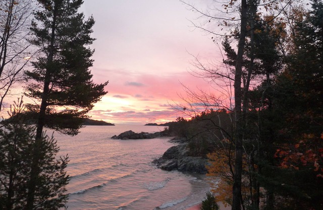 Quiet, secluded oasis with 300 ft of Lake Superior beach and 10 wooded acres.