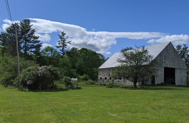 Quintessential New England Farmhouse with mountain views.