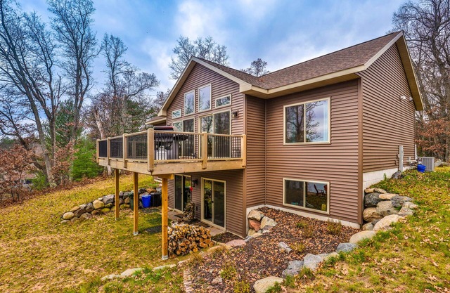 Recreational lakefront home w/private dock, trails access, & washer/dryer