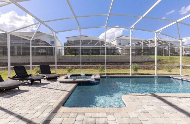 Refreshing 6 Bed Pool Home with Game Room Pool/Spa