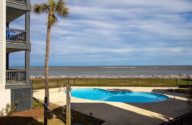 Relax and Unwind at 709 Ocean Cottage – Golf Cart and Resort Access Included!