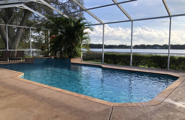 Relax at Southern Exposure in Auburndale with a Pool & 76 Acre Private Lake.