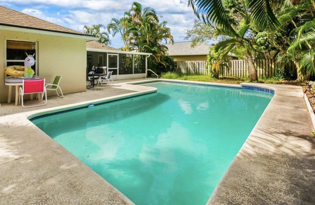 Relax at the pool and beach and rental boat available close by
