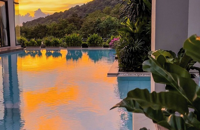Relax in a Spacious Deluxe King Room with Mountain &Distant Sea View