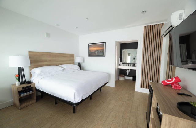 Relax in Rehoboth Beach with Outdoor Fireplace, Free Weekend Breakfast & Parking