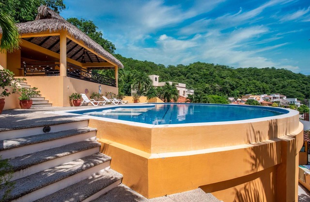 Relax in this spacious home in a quiet community with shared pool and BBQ area