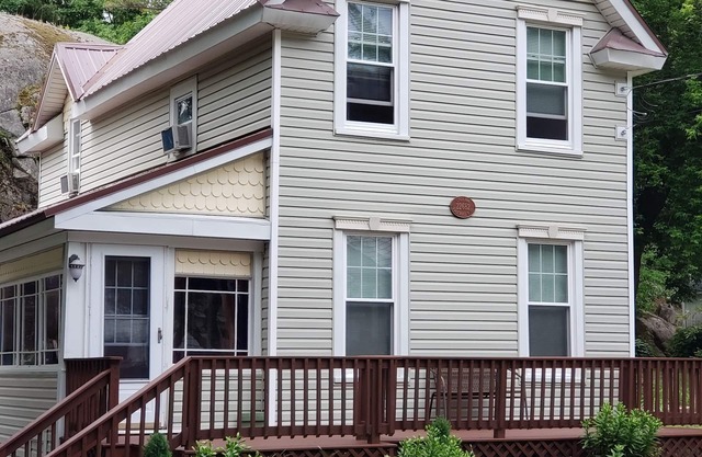 Relax Outdoors In This Updated Village Home. Walking Distance to Downtown