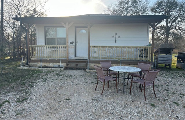 Relax & Recharge in Paige, Tx - 15 Acres, Fishing, and Farm Animals Await