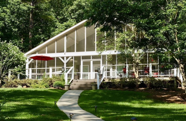 Relaxing 3 bedroom home on quiet cove with large enclosed porch plus more!