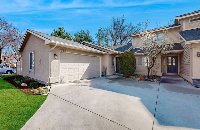 Relaxing retreat with a gas fireplace, fenced yard, patio, & washer/dryer