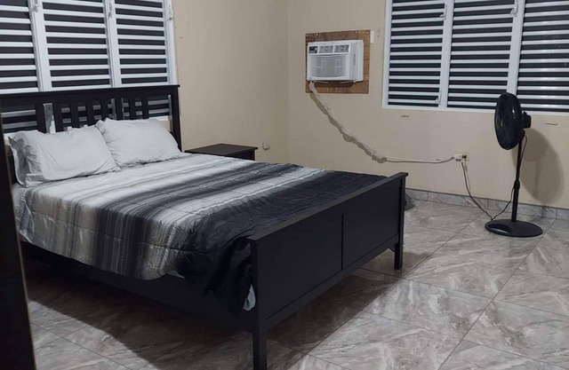 Renovated and private family home, minutes from the local beaches and waterfall!