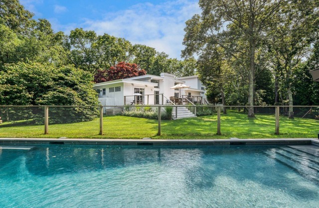 Renovated modern mid-century ranch, polished landscaping, heated saltwater.